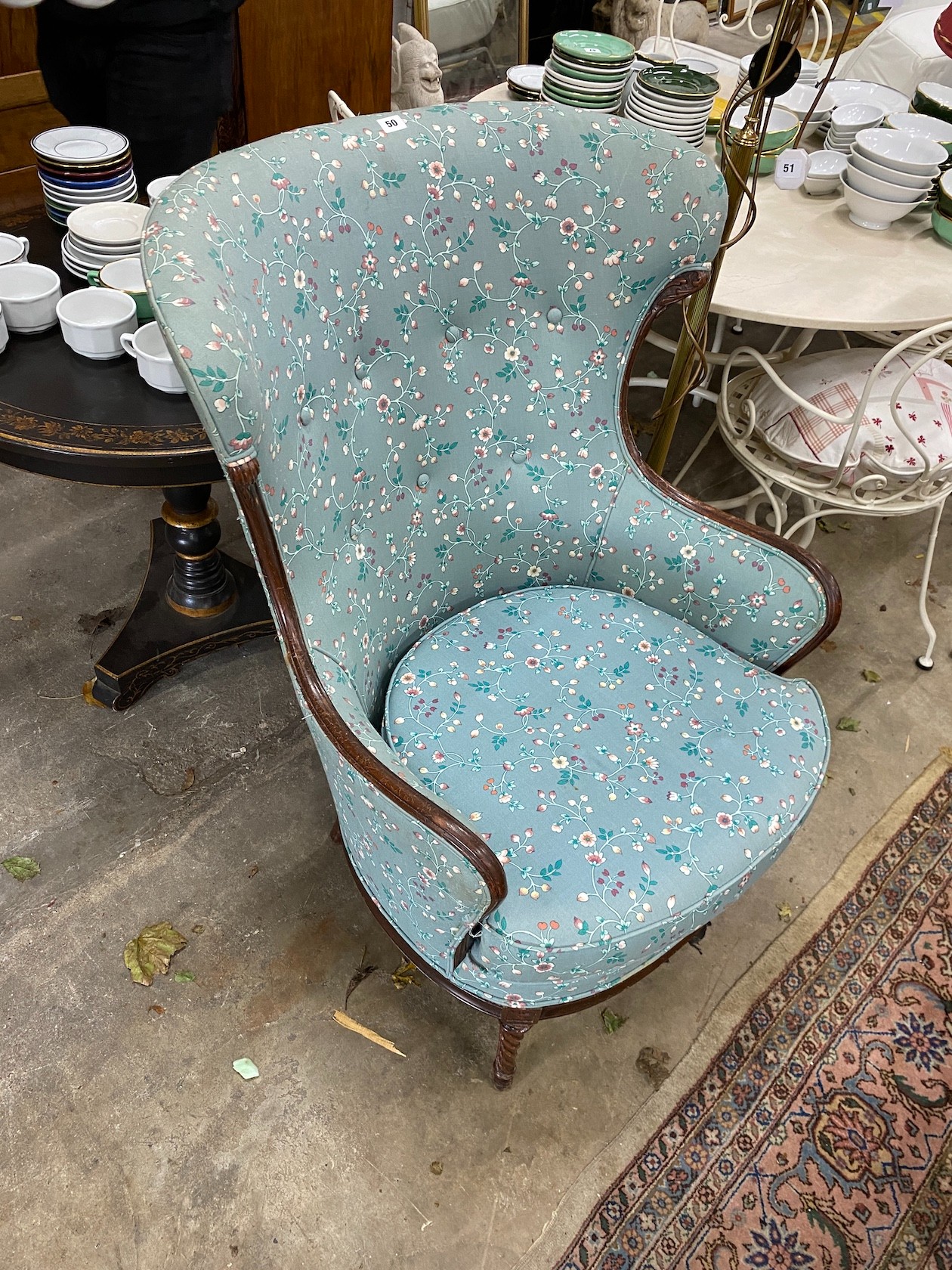 An early 20th century American mahogany upholstered armchair on spiral carved feet, width 79cm, depth 80cm, height 106cm